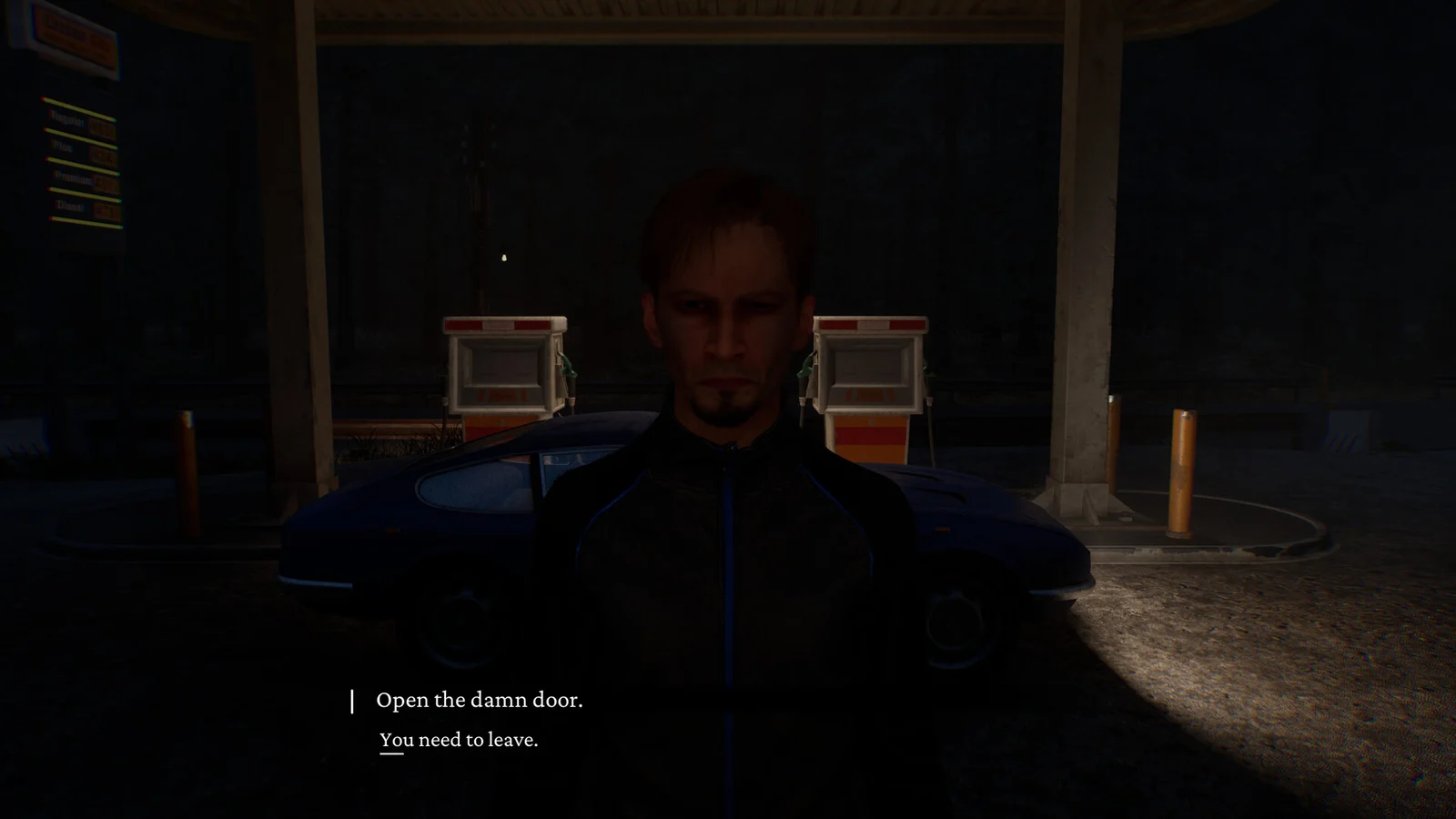 A visitor waits outside the station during a conversation