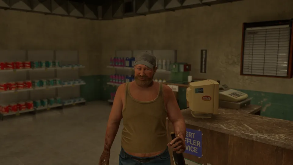 An old man with a beer at the counter