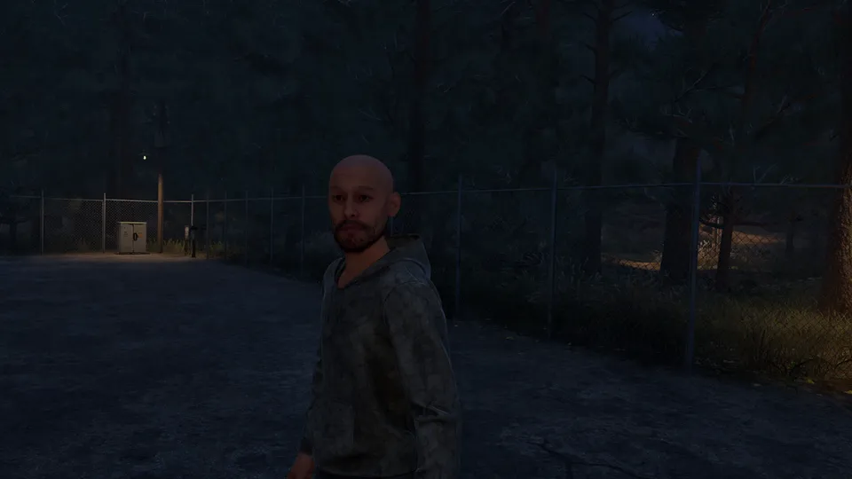 A customer walks toward the station from the dark road